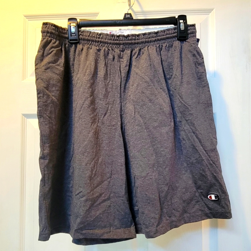 Men's Jersry shorts with pockets, NWT, color is gray, Champion Brand.
